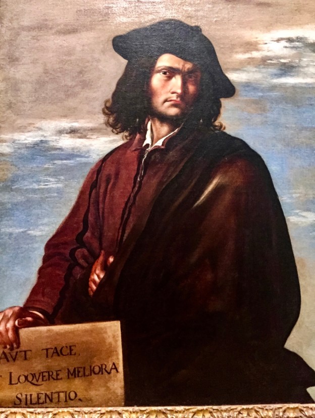 Salvator Rosa, Autoritratto (1645 circa), olio su tela, 116,3×94 cm, National Gallery. Sulla cartella in basso a sinistra è riportata la seguente iscrizione: (latino) «Aut tace aut loquere meliora silentio - O taci, o di' cose migliori del silenzio